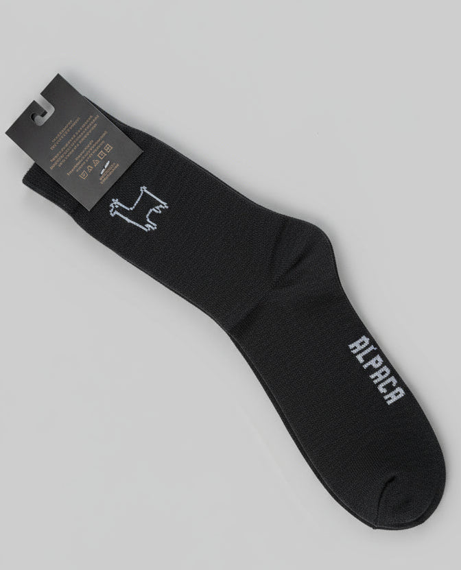 Dark gray alpaca socks with brand logo TINKU made in Bolivia